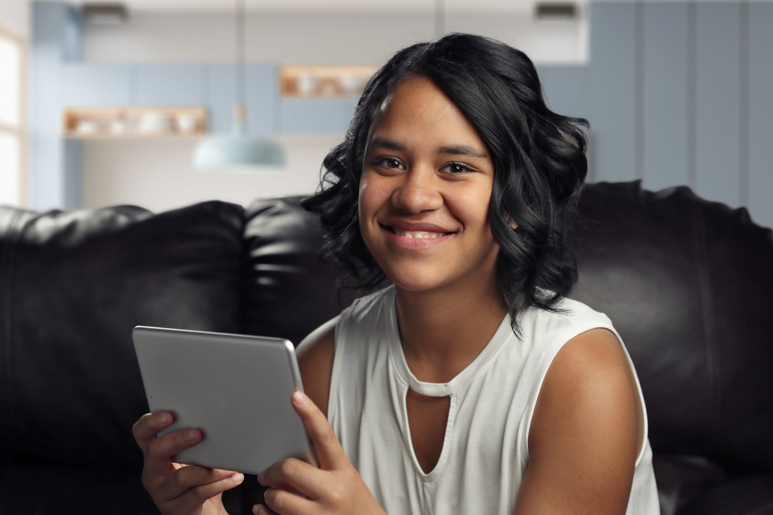 Smiling happy student homeschooling with Power Homeschool Acellus courses